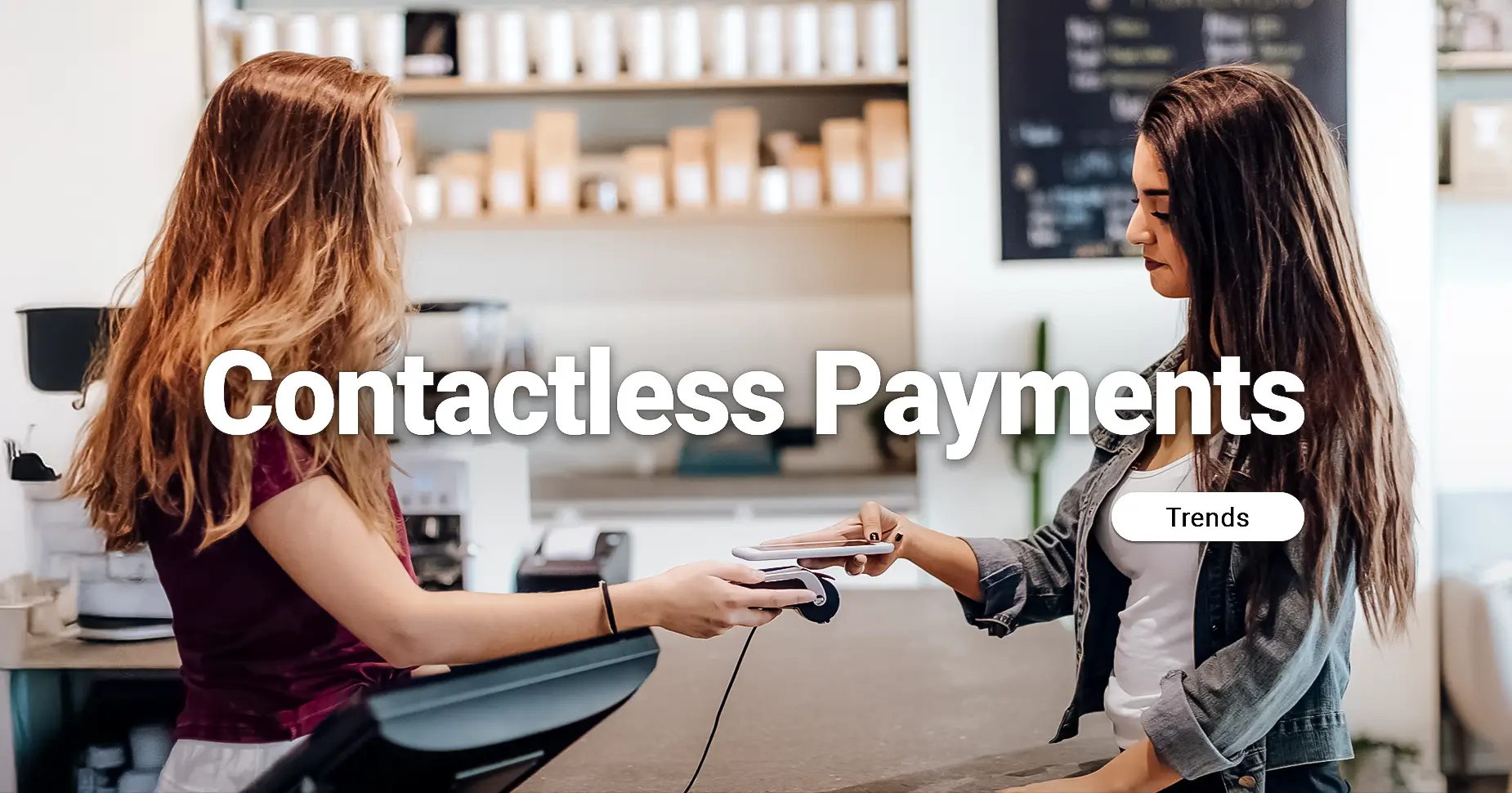 Customer making a Contactless Payment with a smartphone at a store counter.